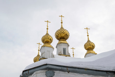 Gilded domes of the Orthodox Church, village of Karabanovo, Kostroma region, Russiaの写真素材