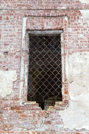 window of the destroyed red brick wall church