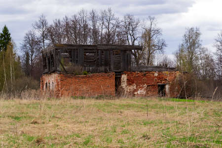 destroyed lonely two-story old house landscapeの写真素材