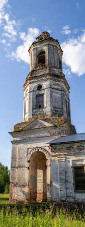 old Orthodox bell tower, church of the village of Pokrovskoye, Kostroma province, Russia. Year of construction 1800. Currently, the temple is being restored.の写真素材