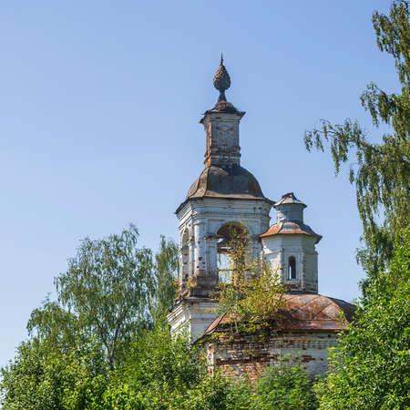 an abandoned Orthodox church in the forest, the church of the village of Sobolevo, Kostroma province, Russia. The year of construction is 1776. Currently, the temple is abandoned.の写真素材