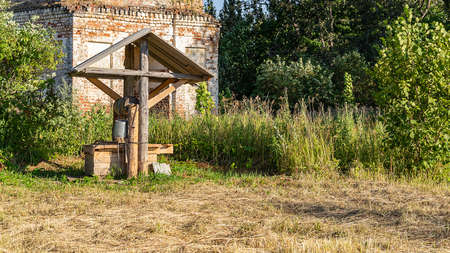 a wooden well in a Russian villageの写真素材