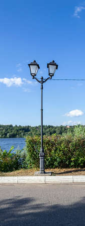 old street lamp on the river embankmentの写真素材