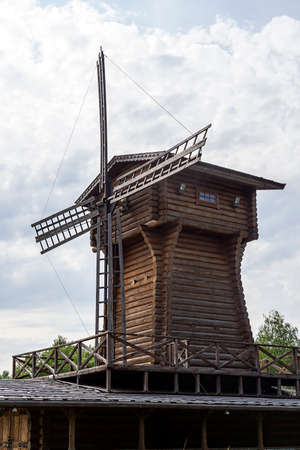 old wooden windmill in the villageの写真素材