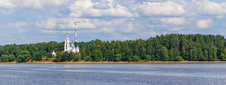 Orthodox church on the river bank, Okhotino village, Yaroslavl region, Russiaの写真素材