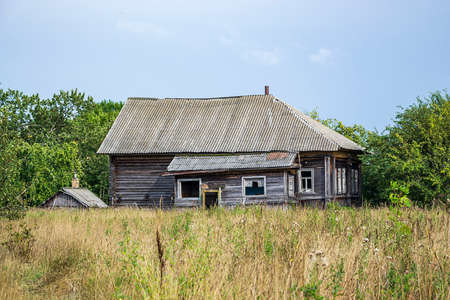 destroyed houses in an abandoned village, Kostroma region, Russiaの写真素材