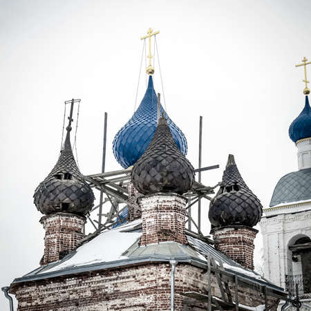 domes of the restored church, Isakovskoye village, Kostroma region, Russia
