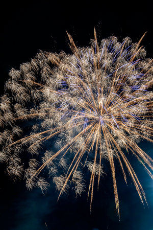 fireworks against the sky in the eveningの写真素材