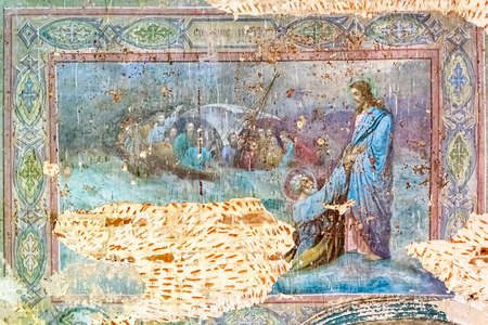 pictures on the wall of an abandoned temple, the temple of the village of Stolpino, Kostroma region,...