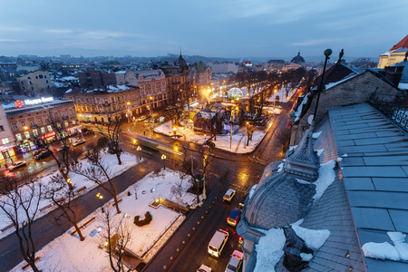 Lviv, Ukraine - February, 2014 - top view Liberty Square on the avenue in the winter evening in Lviv, Ukraine.のeditorial素材
