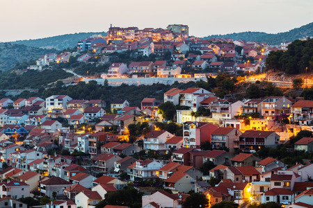 evening Top view of modern buildings in the city of Sibenik, Croatia.の写真素材