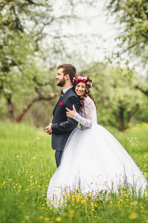 Wedding walk on nature. Bride and groom togetherの写真素材