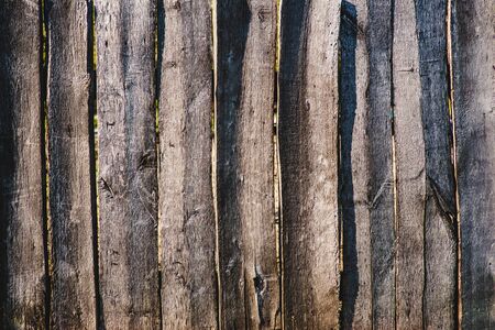 Close up of line light brown wooden fenceの写真素材
