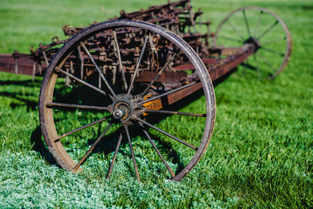 Old iron plow used in the past as a tool in agricultureの写真素材