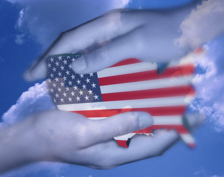 Hands protecting Americaの写真素材