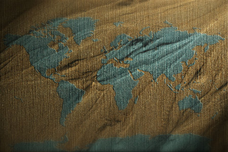 World map on sand backgroundの写真素材