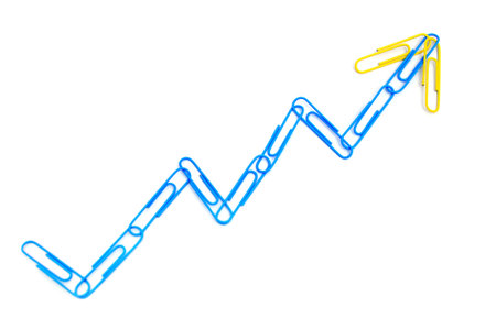Blue paper clips connected in a conceptual chartの写真素材