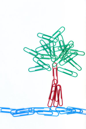 Conceptual tree from paper clips on white backgroundの写真素材