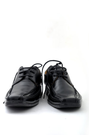 Pair of man black shoes on white backgroundの写真素材