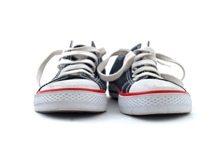Pair of blue sneakers on white backgroundの写真素材