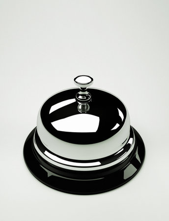 Close up of a silver bell on white background - this is a 3d render illustrationの写真素材