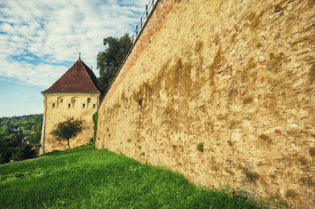 View from the outside with the wall of the Sighisoara fortress,  Romania, Transylvaniaの写真素材