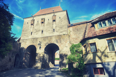 Historic tower gate in of the Fortress Sighisoara in Romania, Transylvaniaの写真素材