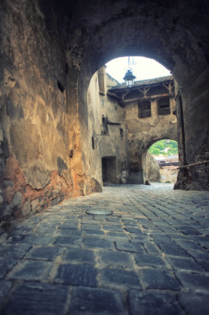 Passage under the Clock Tower in the citadel of Sighisoara in Romania - Transylvania,の写真素材