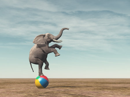 Surreal image of an elefant balancing on a beach ball - 3d render illustrationの写真素材