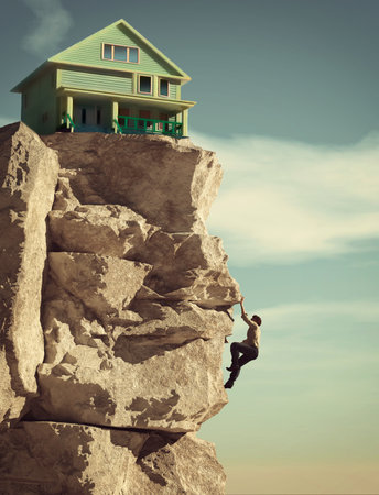 Man climbing on a mountain to a house. House at the edge of the mountain cliff. This is a 3d illustration.の写真素材