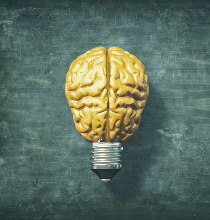 Light bulb with a yellow brain instead of the glass.  3d render illustrationの写真素材