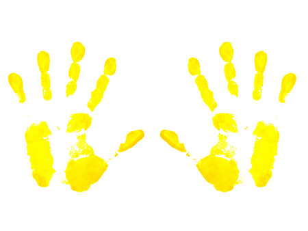 yellow handprint isolated on white backgroundの写真素材