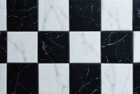 Fragment of the floor from the black-and-white tile