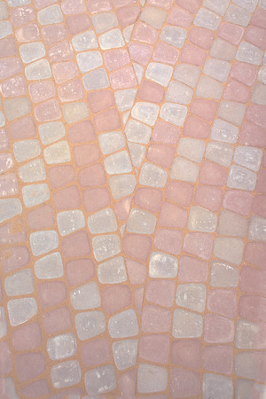 Background of stones, which lined cobblestone pavementの写真素材