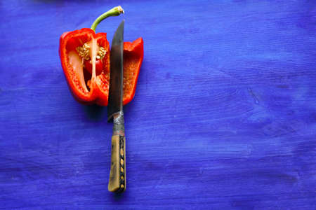 red sweet pepper on a blue backgroundの写真素材
