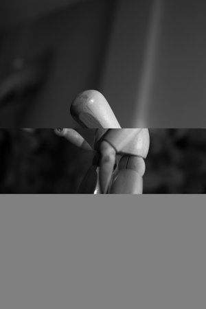 wooden doll on the background of the stage. black and whiteの写真素材