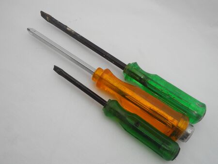 screwdriverbackground black build building craft diy driver hobby isolated overhead plan repair screw screwdriver slotted tool tools trade tradesman view whiteの写真素材