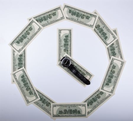 Wall clock collected from 13 denominations of dollars.の写真素材