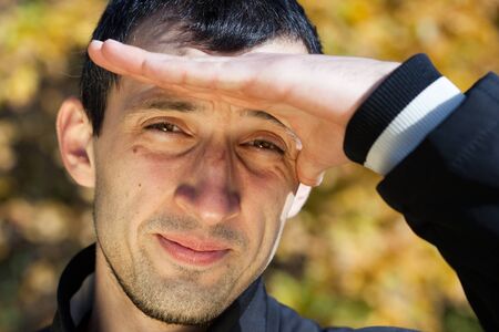 The person of the young man close up. Fall.の写真素材