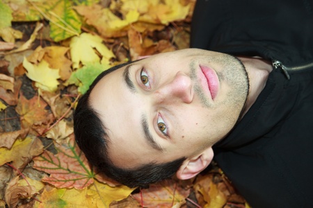 The person of the young man close up. Fall.の写真素材