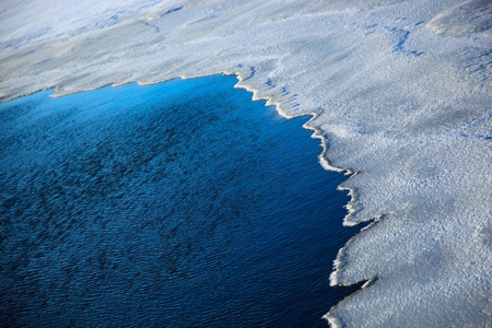 Water and ice in the river. An ice-hole in the winter.の写真素材