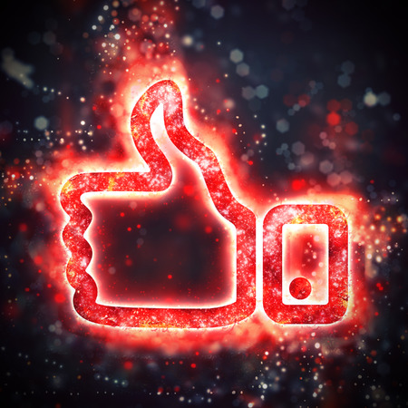 Red thumb up sign with bokeh elementsの写真素材