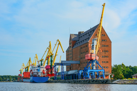 Kaliningrad, a cargo ship on the dock at the old grain Elevator in the port