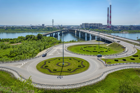 View of the road junction, the bridge and the historic industrial district of Kemerovo from the high...