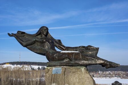 Kemerovo, a sculpture symbolizing the Tom river on the Pritomskaya embankment in winter, Siberia, Kuzbass, Russiaの写真素材