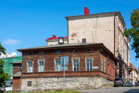 Vyborg, Russia-13 August 2019: Old wooden apartment building on Watchtower street in the old part of the city, Vyborg, Russiaのeditorial素材