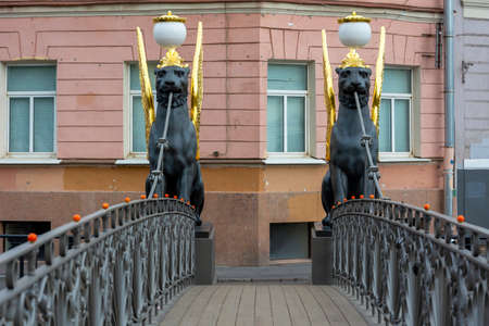 Saint Petersburg, Russia-14 August 2019: Griffin statues on the pedestrian Bank bridge over the Griboyedov canal, Saint Petersburg, Russiaのeditorial素材