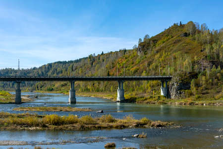 Automobile bridge over the Kondoma river in Gornaya Shoria, Kemerovo region-Kuzbassの写真素材