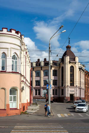 Tomsk, a crossroads with old and new buildings in the historical part of the city