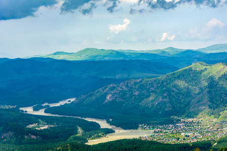 Mountain Altai, view from the observation deck on Mount Malaya Sinyukha, morning fog
